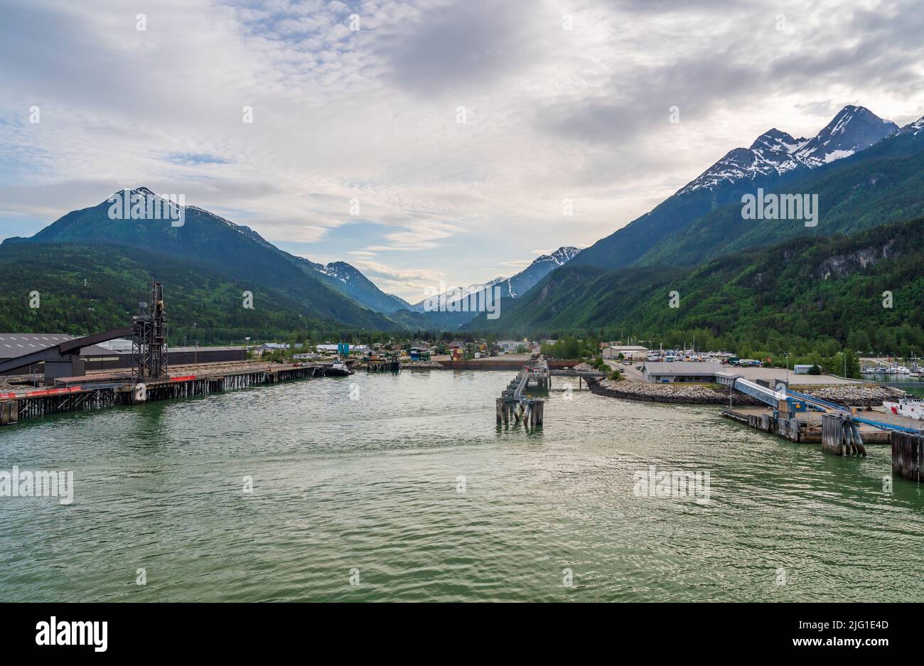View of the docks and the small Alaskan town of Skagway early in the morning Stock Photo