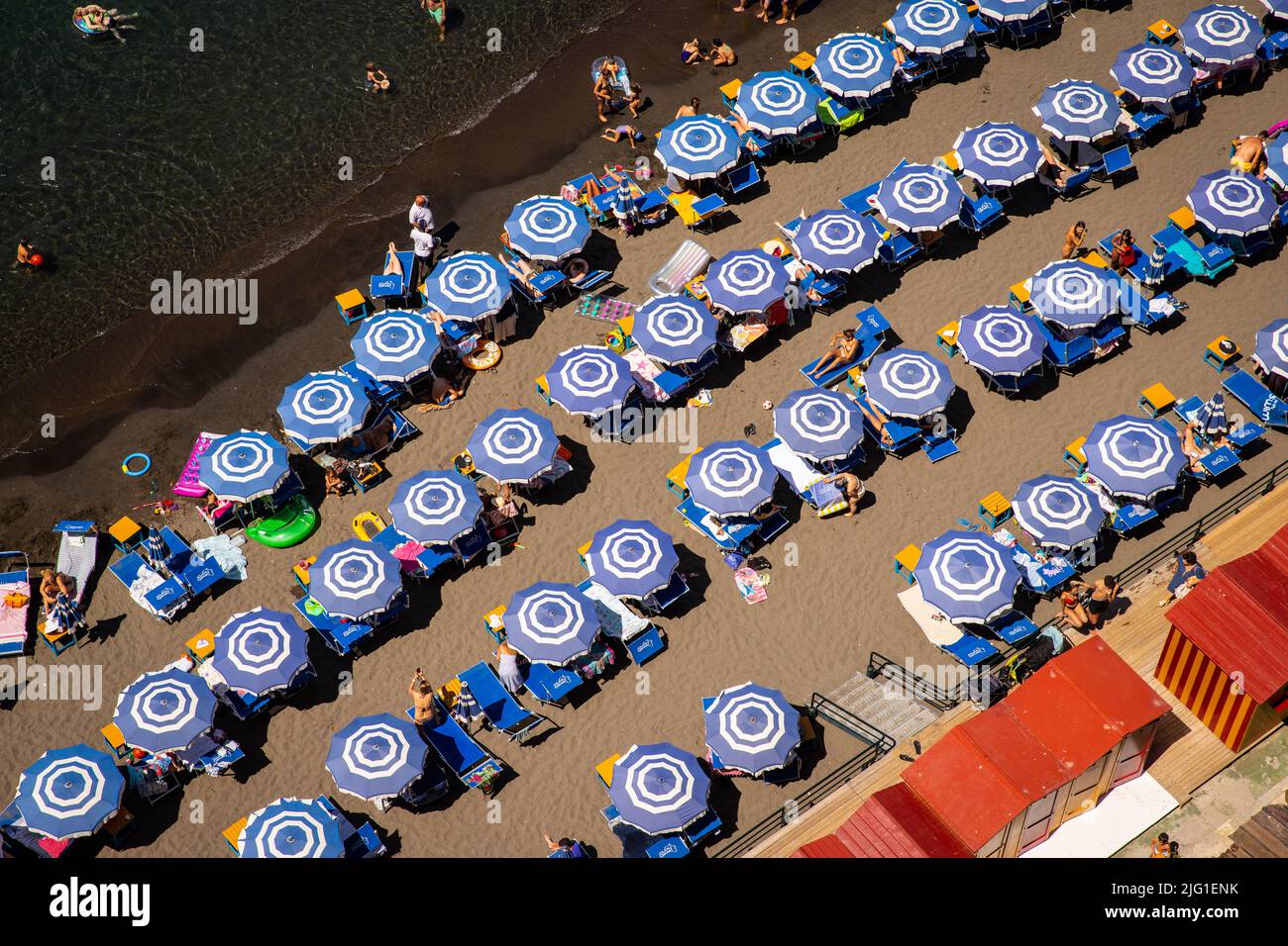 Rows of parasols from above on the beach in Sorrento Stock Photo