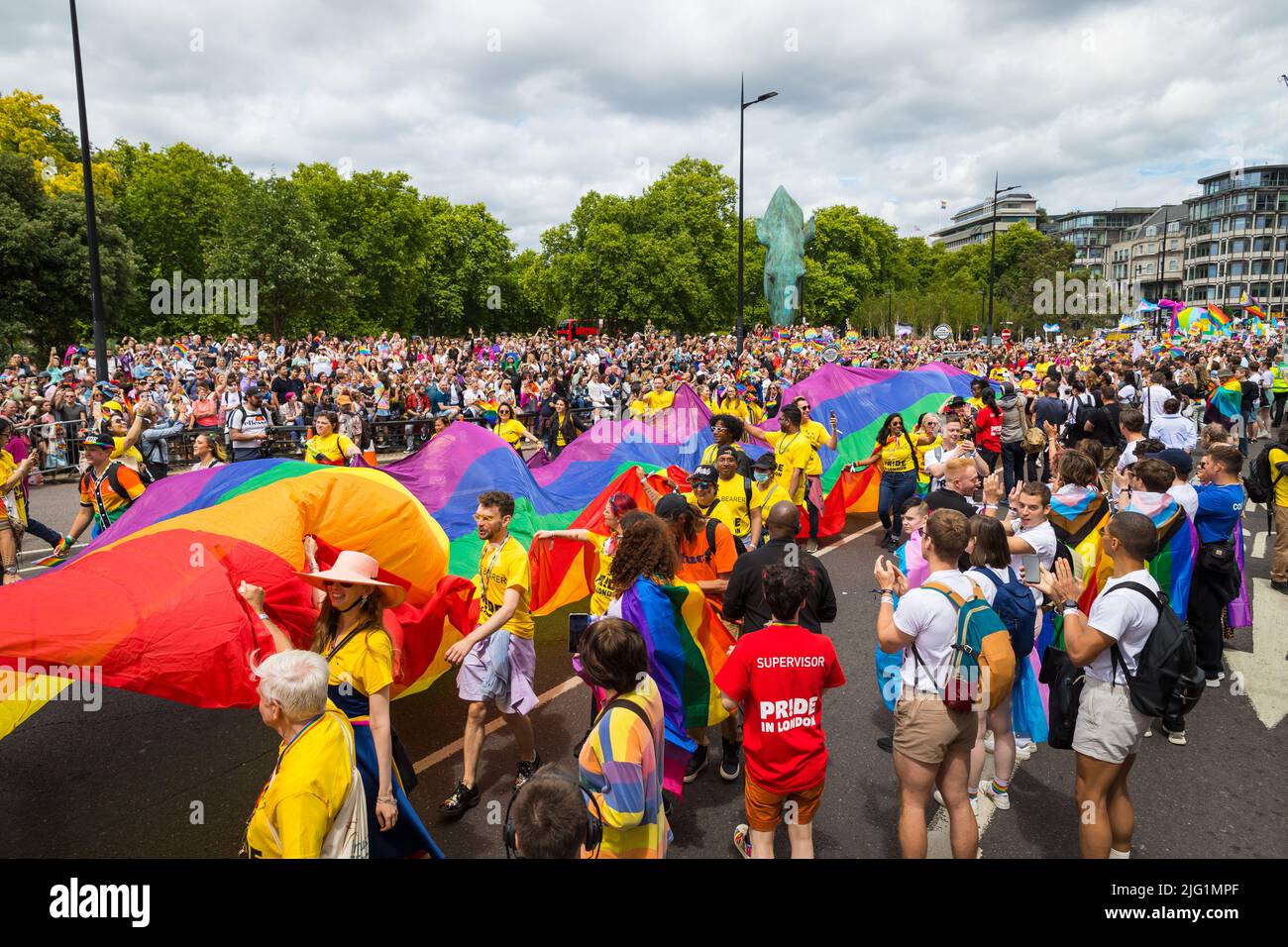 Giant Rainbow flag at the beginning of the Pride in London Parade Stock Photo