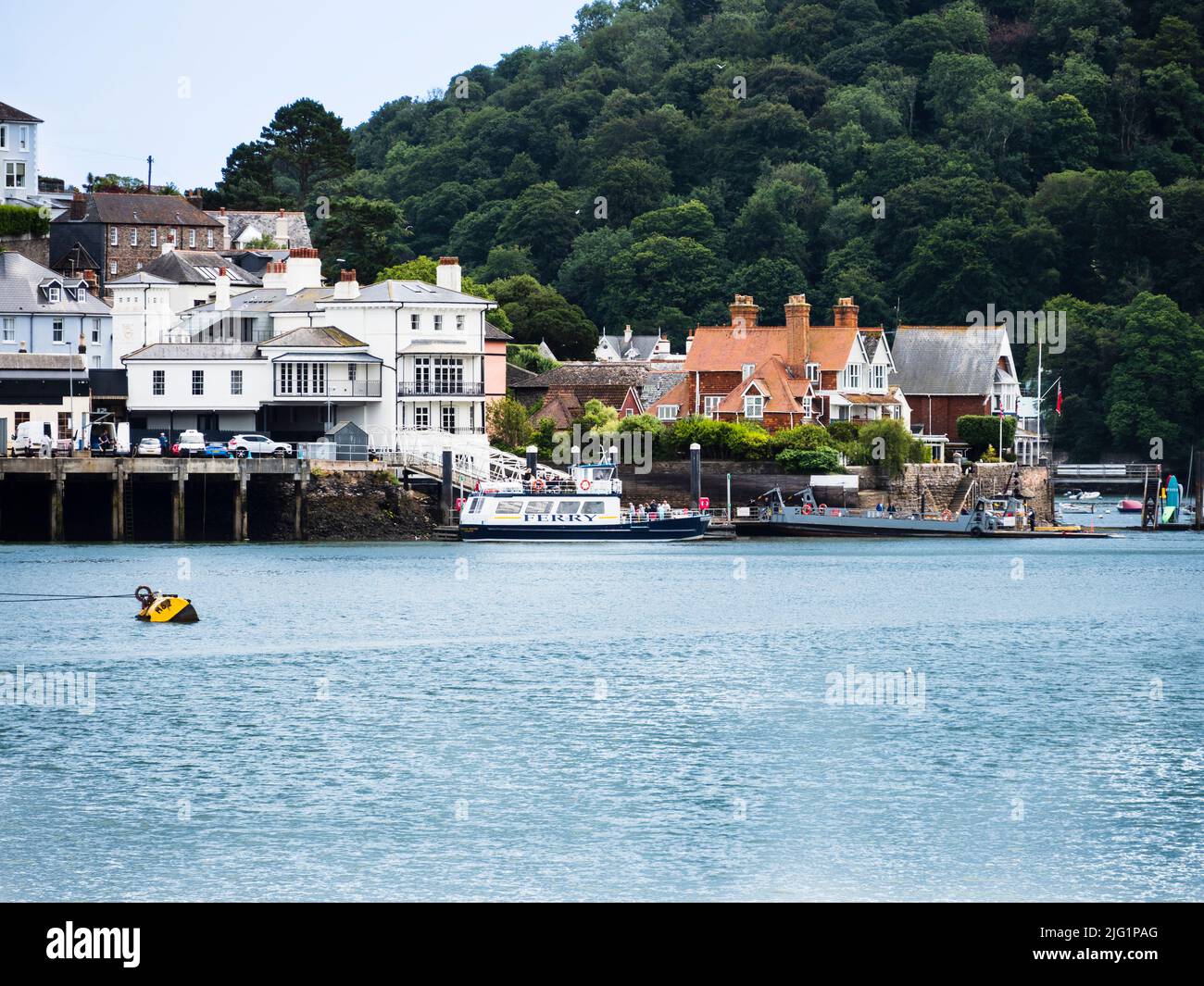 Tug guided lower car ferry and Dartmouth Princess passenger ferry at Kingswear for the trip across the River Dart to Dartmouth, Devon, UK Stock Photo