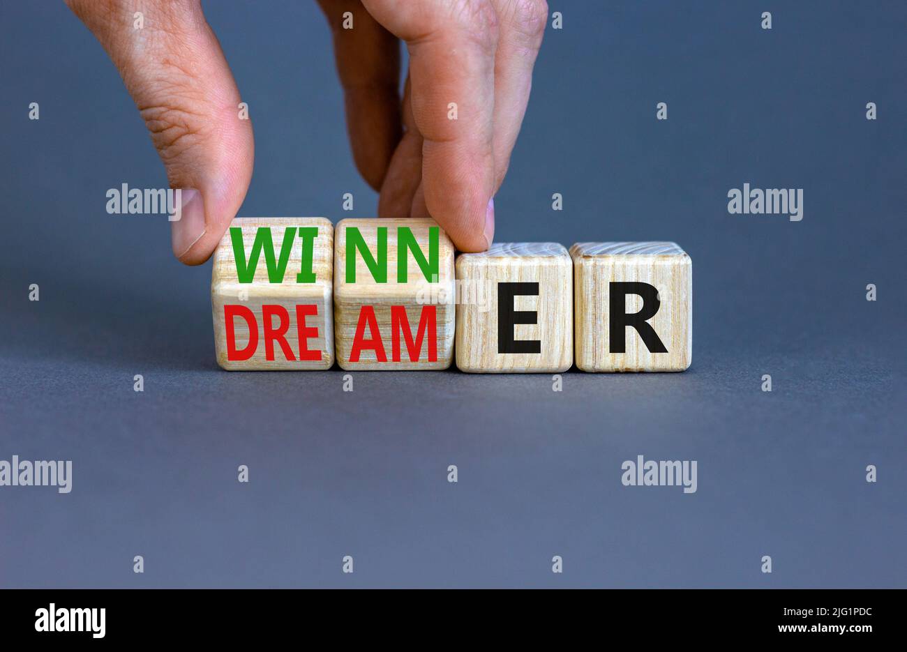 Winner or dreamer symbol. Concept words Winner or dreamer on wooden
