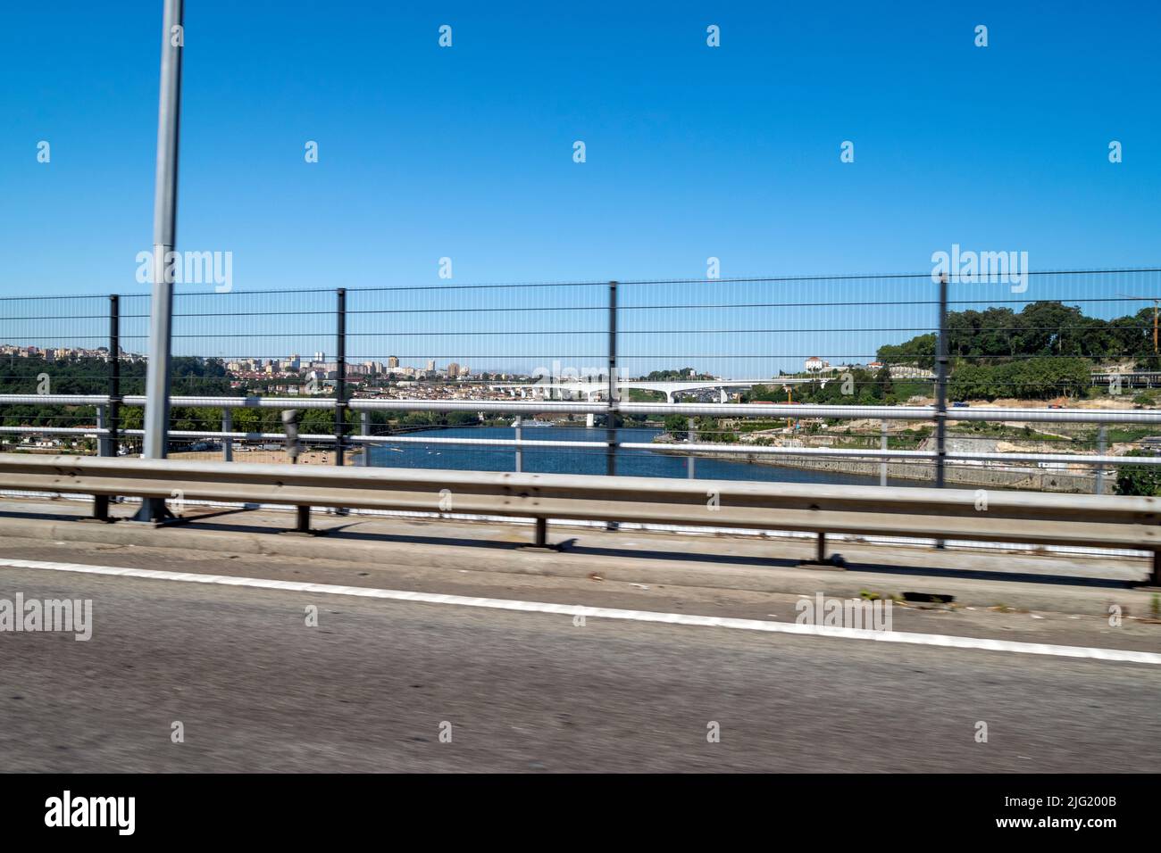 Traveling on cars views. Rivers and bridges on motorways. Stock Photo