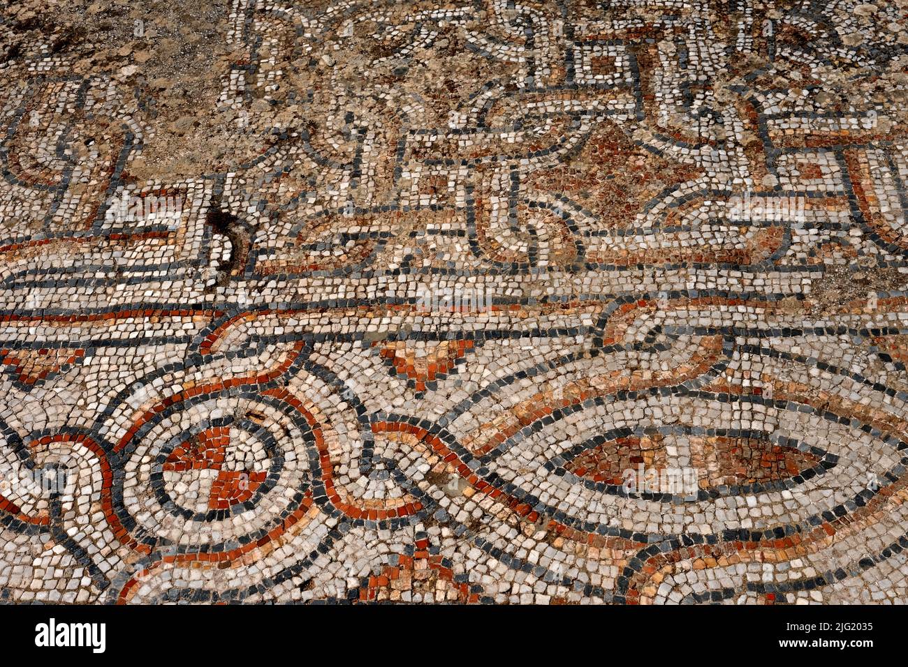 Mosaic floor amongst the ruins of the once great city of Ephesus in Turkey Stock Photo