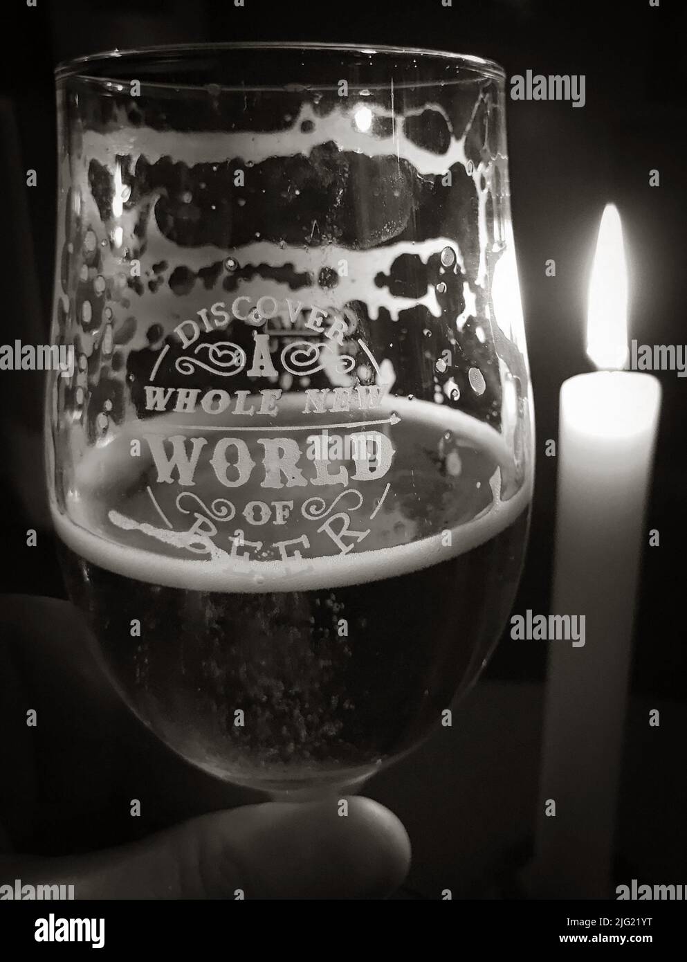 Discover a whole new world of beer ,glass - BW - expand your knowledge of what you drink Stock Photo