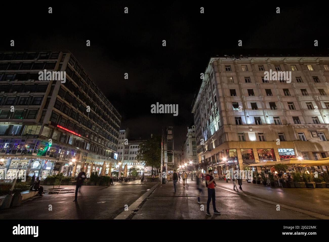 Picture of Trg Republike, also called republic square with people passing by and waiting at night in Belgrade, Serbia. Republic Square or Square of th Stock Photo