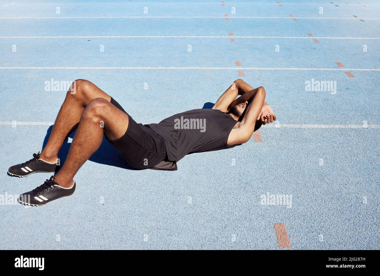 Exhausted man athlete track hires stock photography and images Alamy