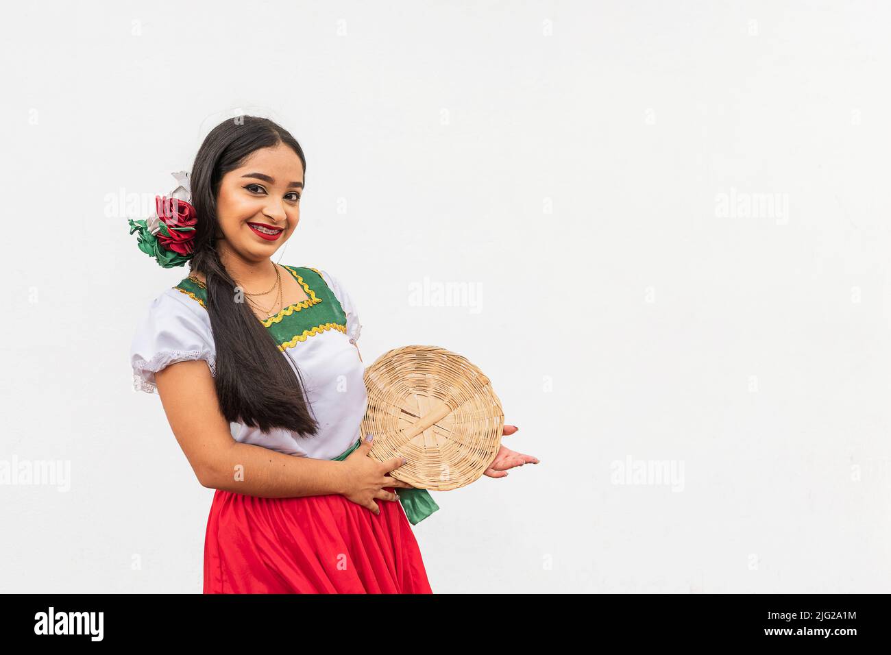 Portrait of young girl on white background Stock Photo - Alamy