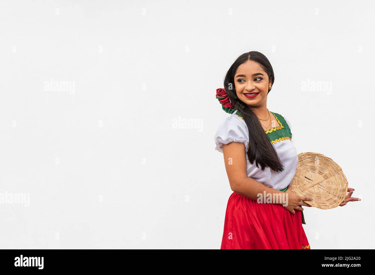 Portrait of young girl on white background Stock Photo - Alamy