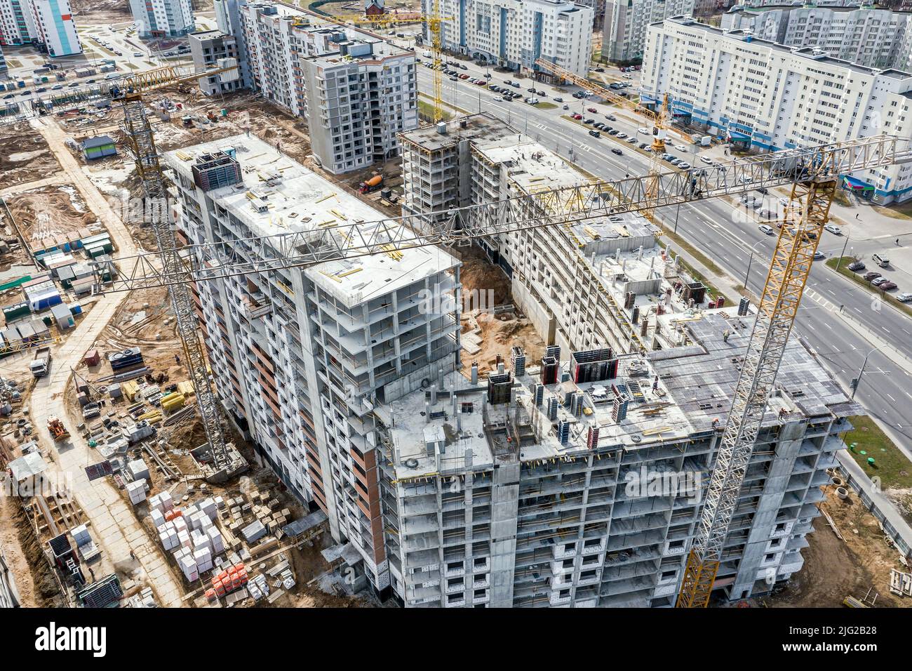 high-rise residential buildings under construction. large construction site, aerial view. Stock Photo