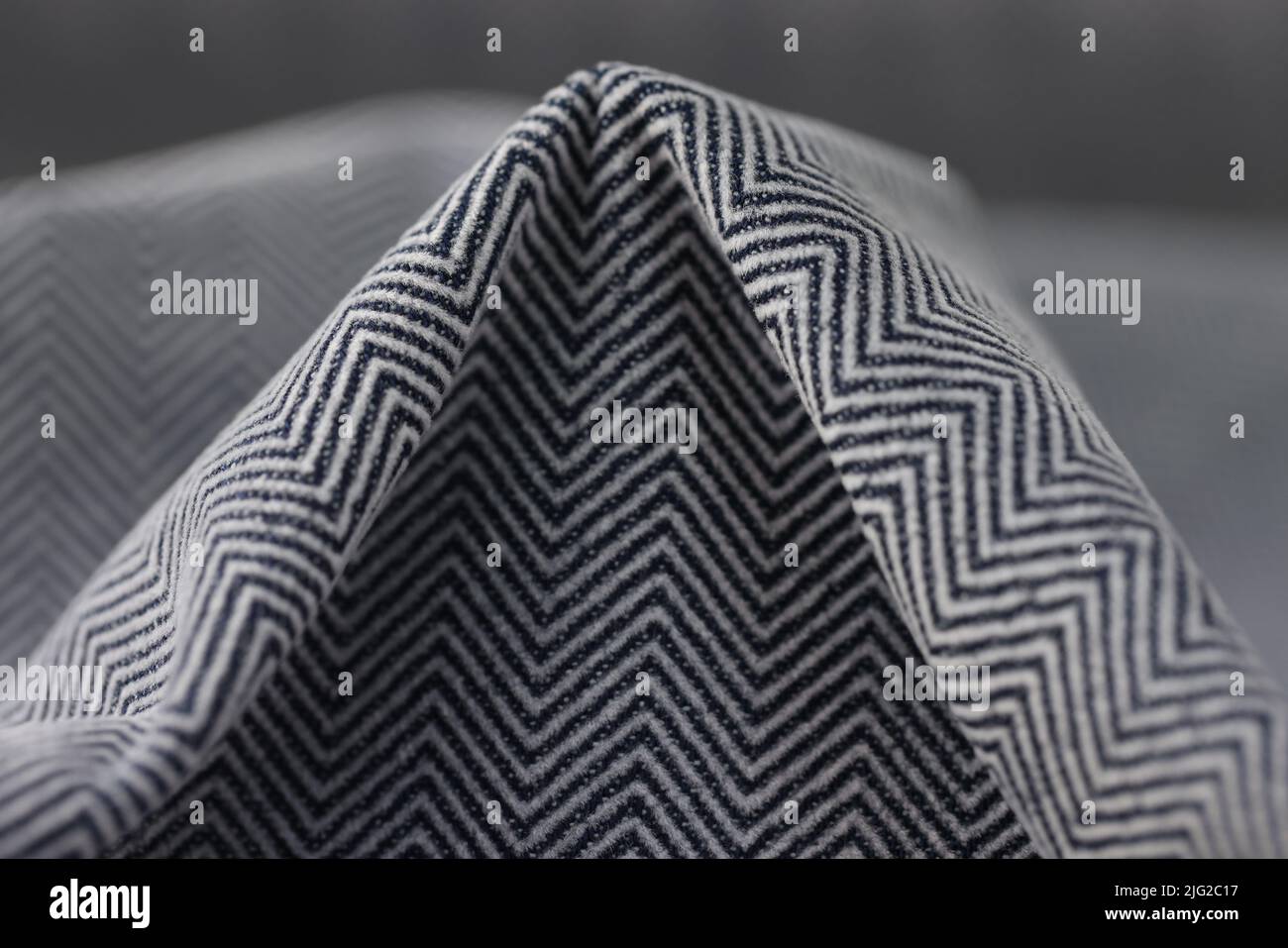 Stylish black and grey herringbone fabric texture background Stock Photo