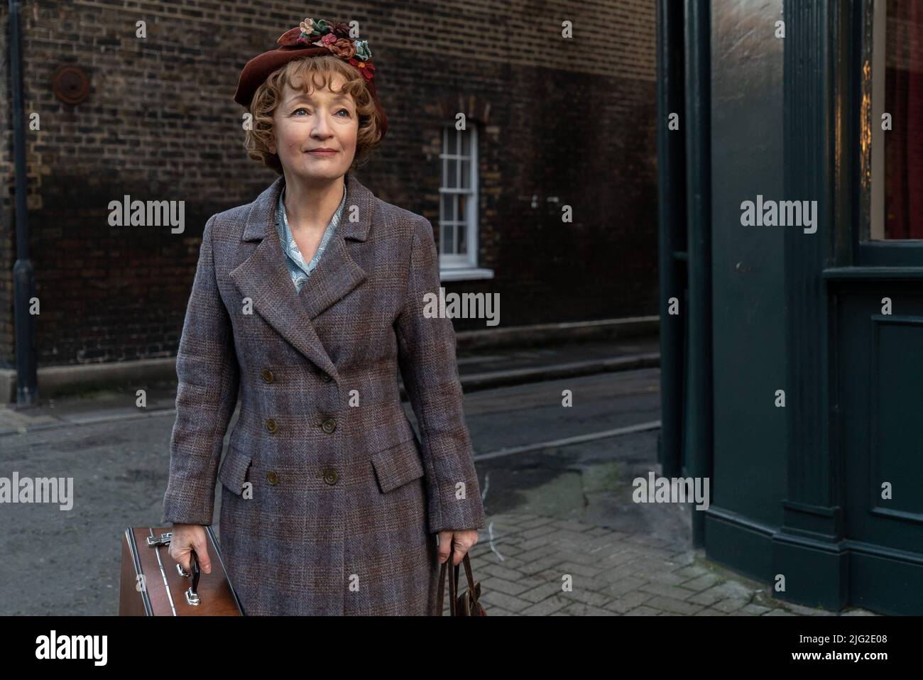 RELEASE DATE: July 15, 2022. TITLE: Mrs. Harris Goes to Paris. STUDIO: Focus Features. DIRECTOR: Anthony Fabian. PLOT: A widowed cleaning lady in 1950s London falls madly in love with a couture Dior dress, and decides that she must have one of her own. STARRING: LESLEY MANVILLE as Mrs. Harris. (Credit Image: © Focus Features/Entertainment Pictures) Stock Photo