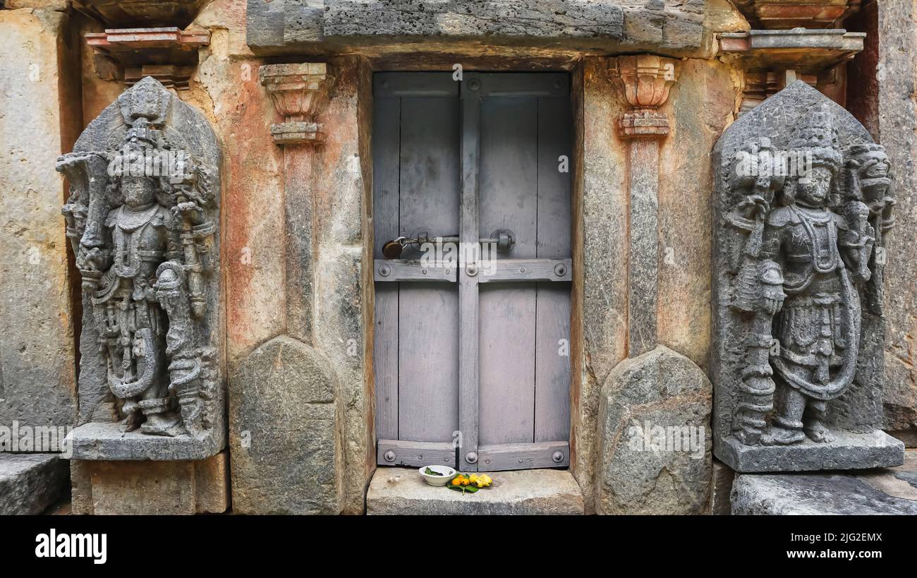 Closed entrance with doorkeepers of Bucesvara temple, Koravangala, Hassan, Karnataka, India. Stock Photo