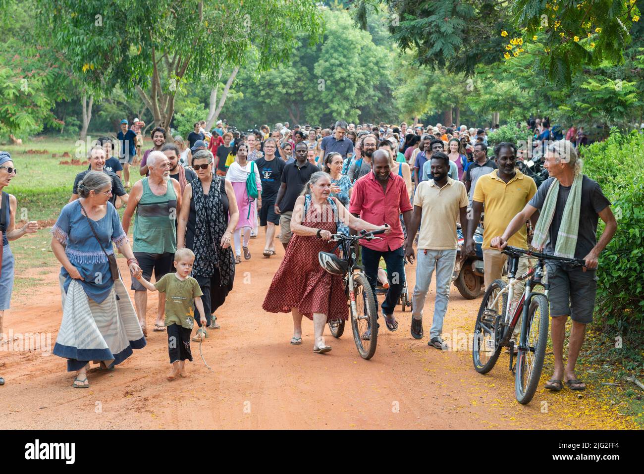 Auroville, India - 2nd July 2022: 500 aurovilians walked to the Banyan tree in response to the threat Auroville is currently facing and to support the Stock Photo