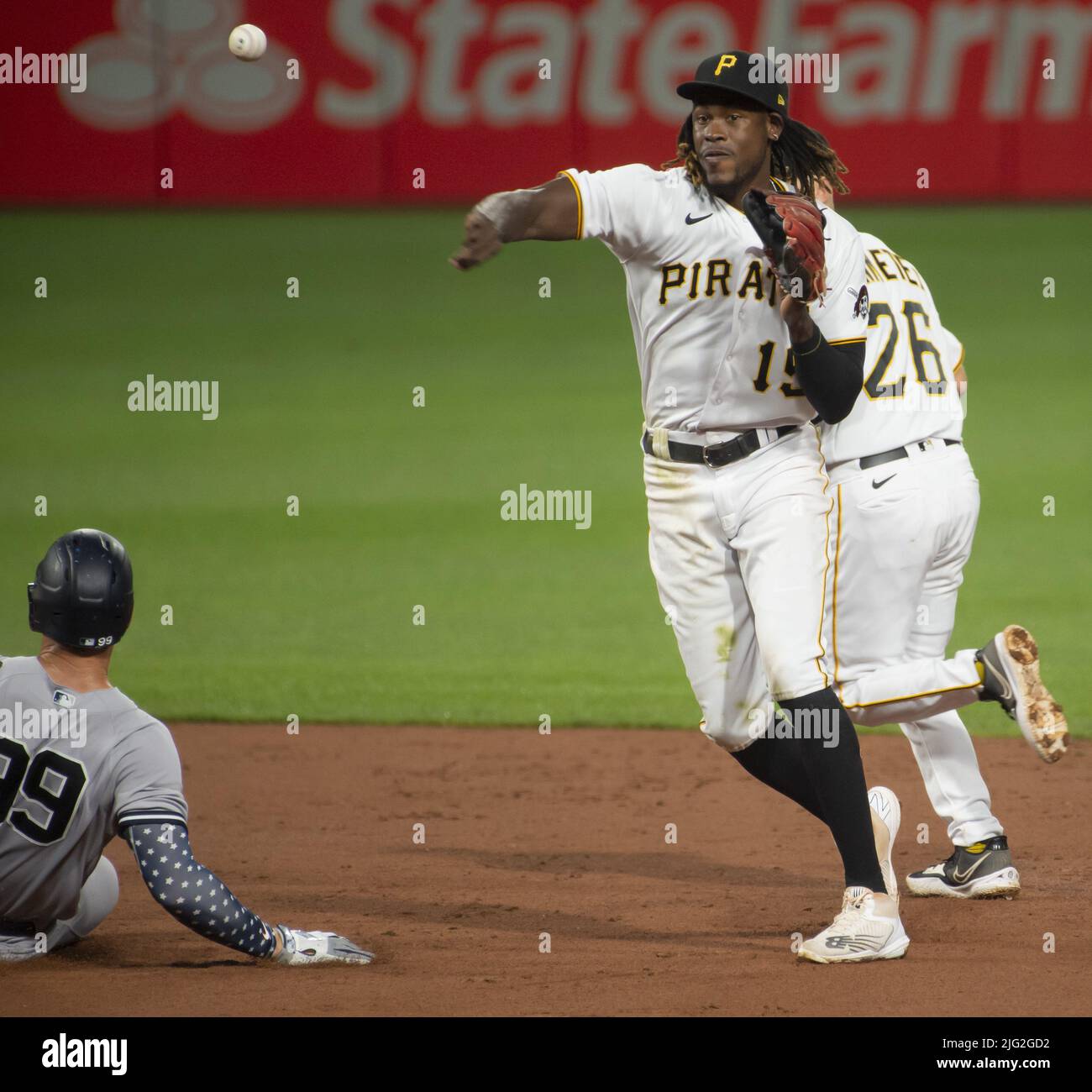 Pittsburgh, United States. 06th July, 2022. Pittsburgh Pirates shortstop Oneil  Cruz (15) step away from the sliding New York Yankees center fielder Aaron  Judge (99) and throws to first for the double