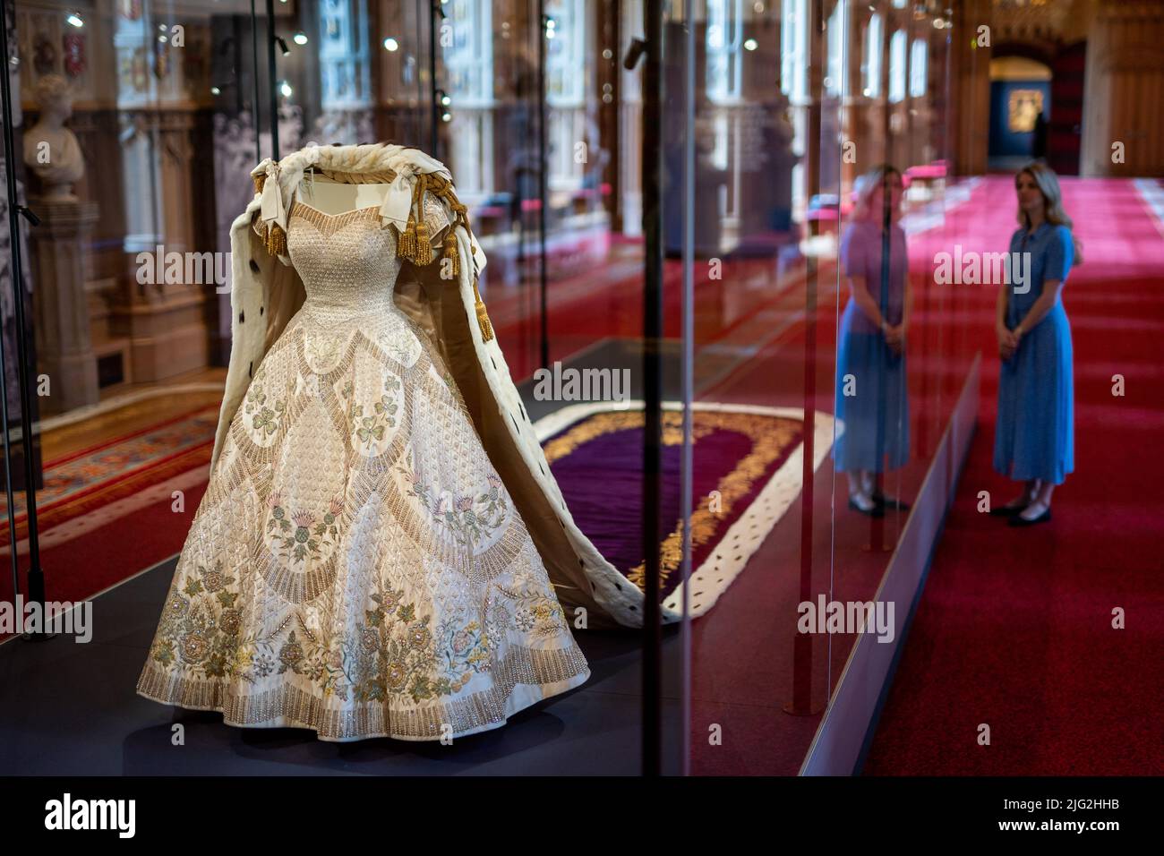 The Queen's Coronation dress on display at 'Platinum Jubilee: The Queen's Coronation', a special exhibition being held in St George's Hall and the Lantern Lobby of Windsor Castle, Berkshire. Picture date: Wednesday July 6, 2022. Stock Photo