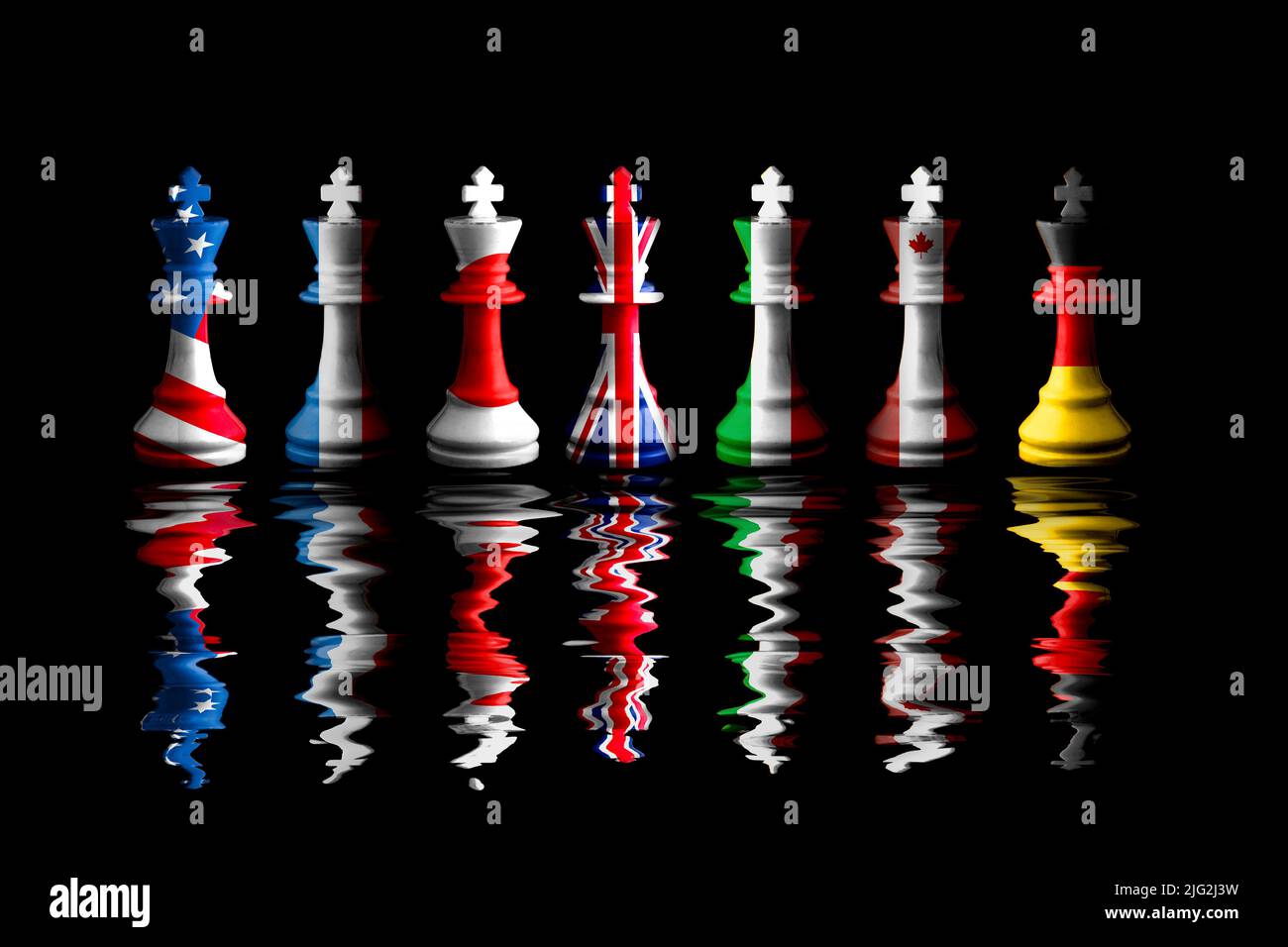 Flag of G7 countries paint over on king chess with black background. G7 are includes USA, Germany, Japan, Canada, France, United Kingdom and Italy. Stock Photo