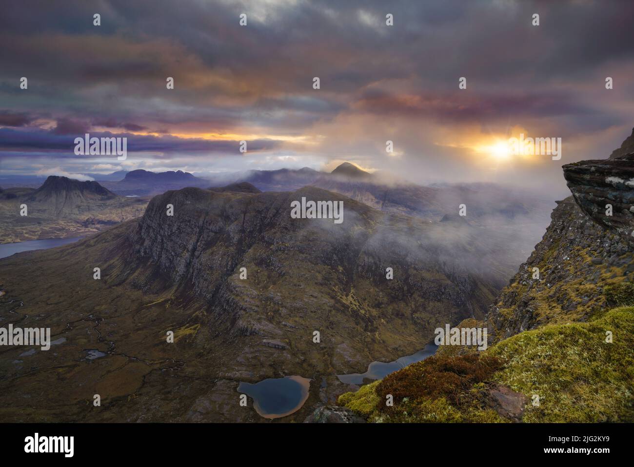 Sunrise over the Assynt and coigach Mountains in the North west highlands of Scotland. Stock Photo