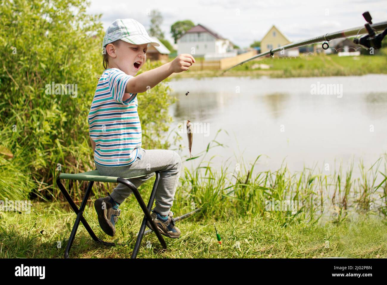 child fishing on the lake Stock Photo Alamy