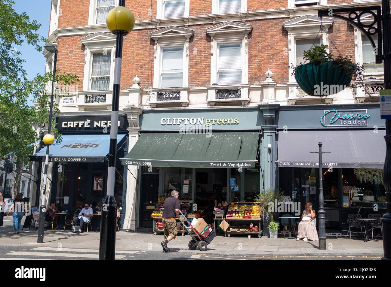 London- June 2022: High Street shops on Clifton Road in W9 west London Stock Photo