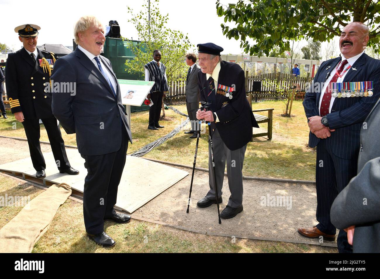 File photo dated 15/08/20 of Prime Minister Boris Johnson meeting veteran Bill Redston following the national service of remembrance marking the 75th anniversary of VJ Day at the National Memorial Arboretum in Alrewas, Staffordshire. Boris Johnson will publicly announce his resignation later today, likely before lunchtime, the BBC is reporting. Issue date: Thursday July 7, 2022. Stock Photo