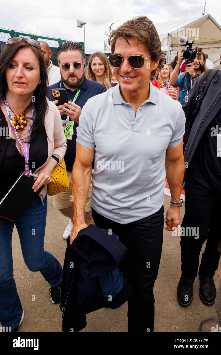 Tom Cruise walks through the paddock at Silverstone ahead of the 2022 F1 British Grand Prix Stock Photo
