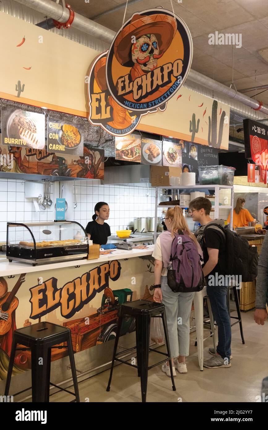 Street food, Tallinn Estonia - customers buying takeaway food, Tallinn, Estonia Europe. Stock Photo