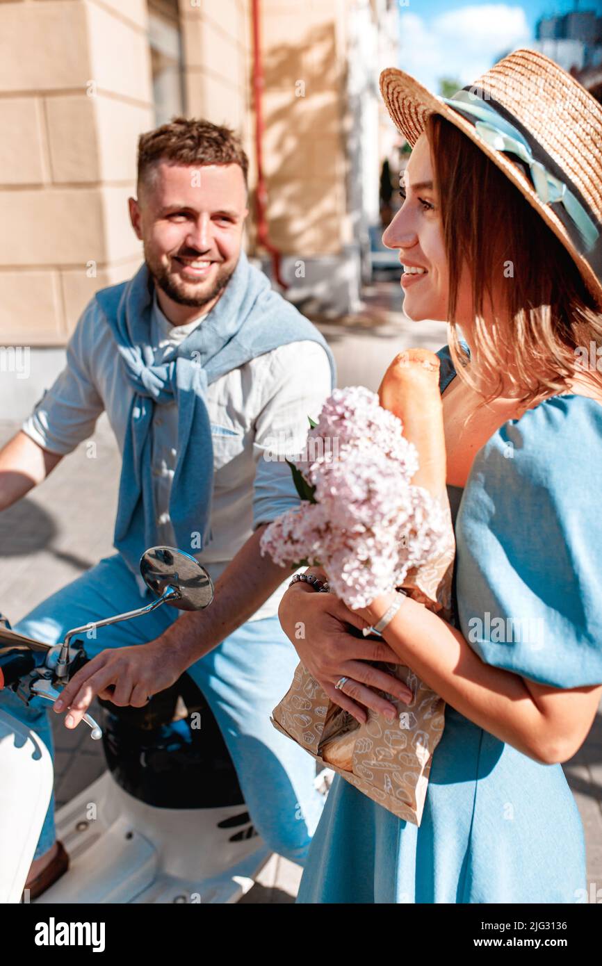 Bearded boy and romantic girl are flirting on the city street Stock Photo