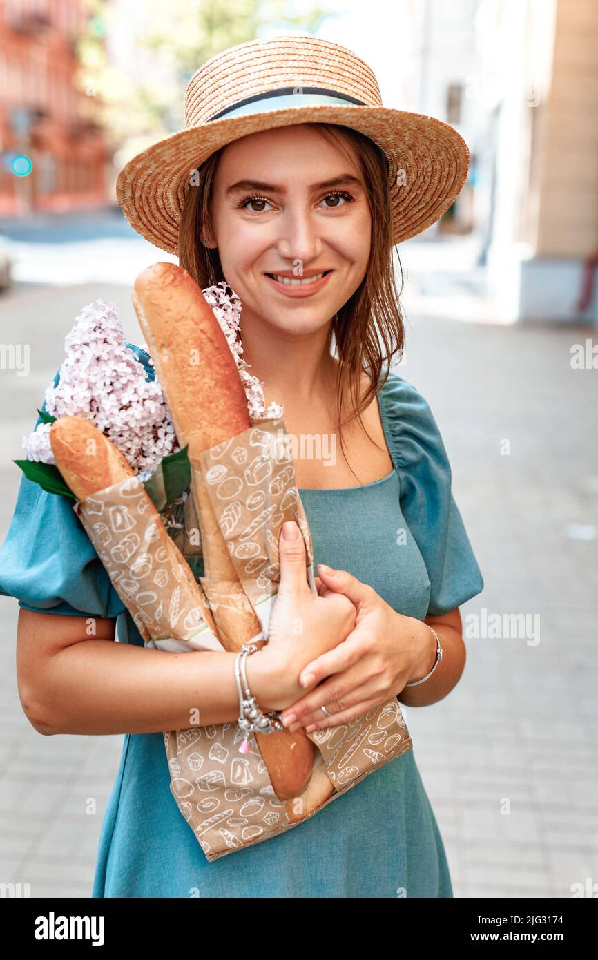 Photo of young girl happy positive smile in straw hat make shopping store eco food Stock Photo
