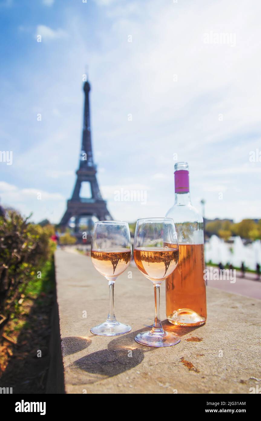 Wine in a glass near the eiffel tower. Selective focus. Nature. Stock Photo