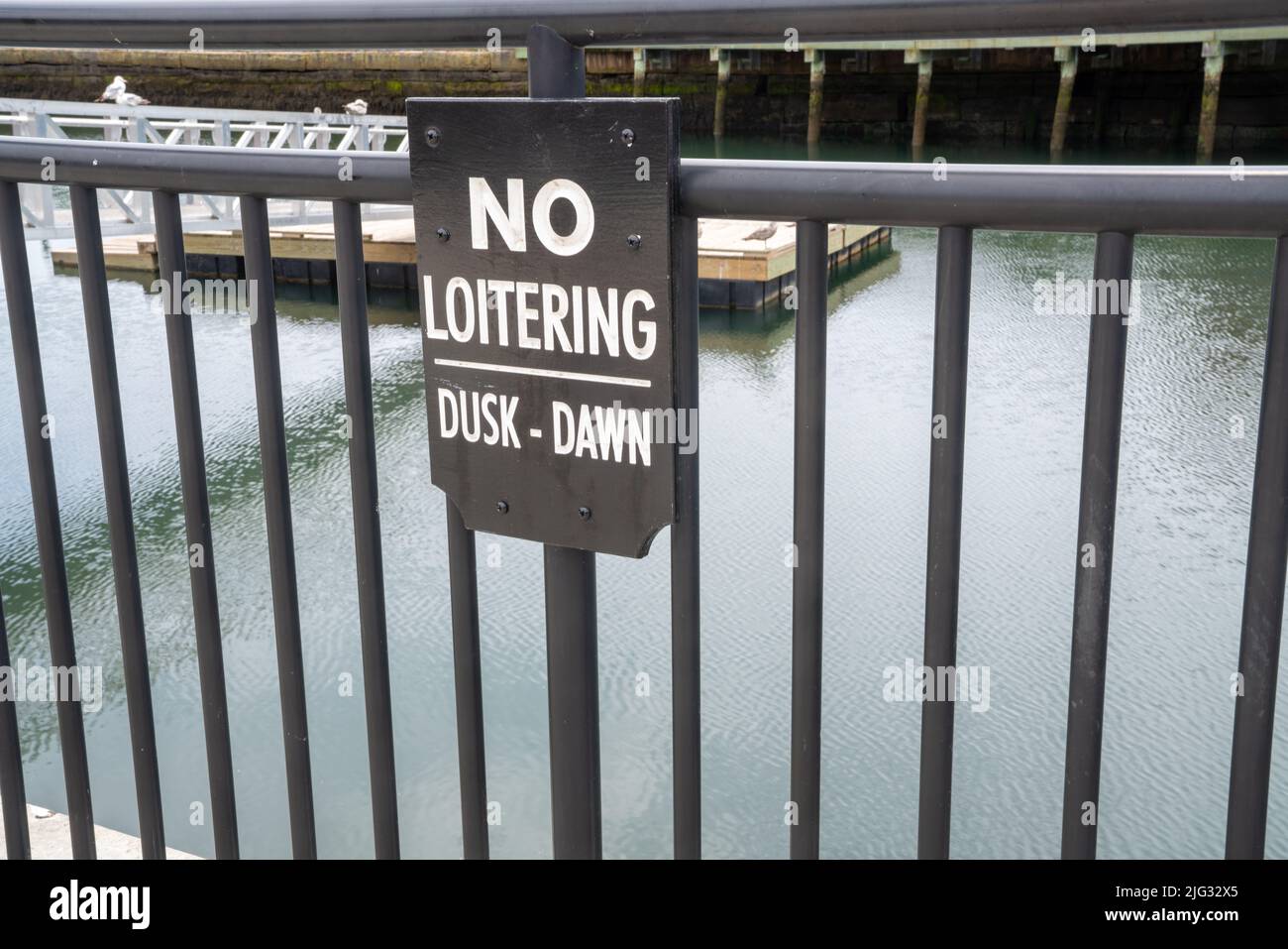 No Loitering Sign near a canal Stock Photo