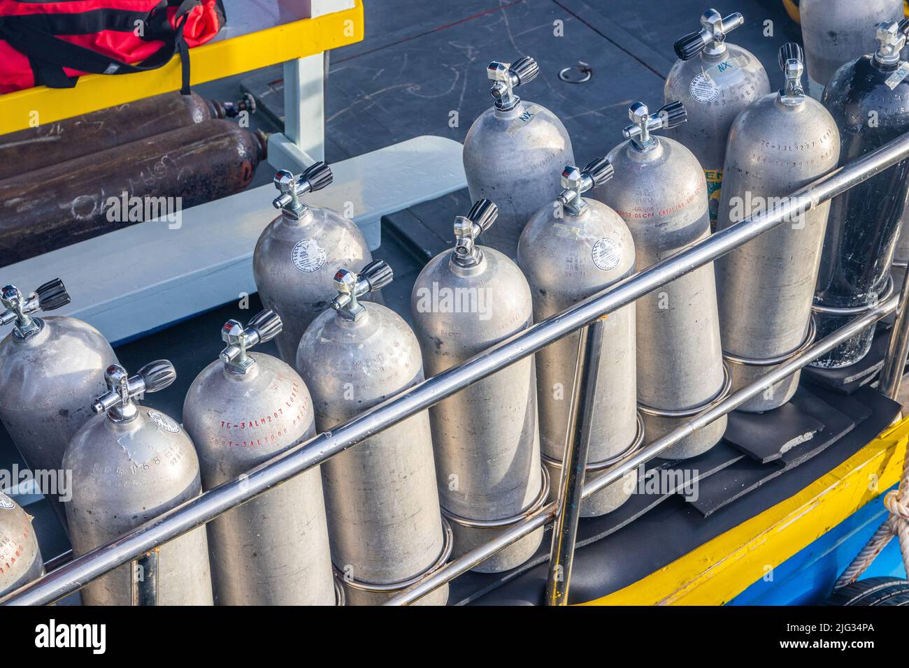 Divers oxygen tanks on a deck of an excursion boat Stock Photo Alamy