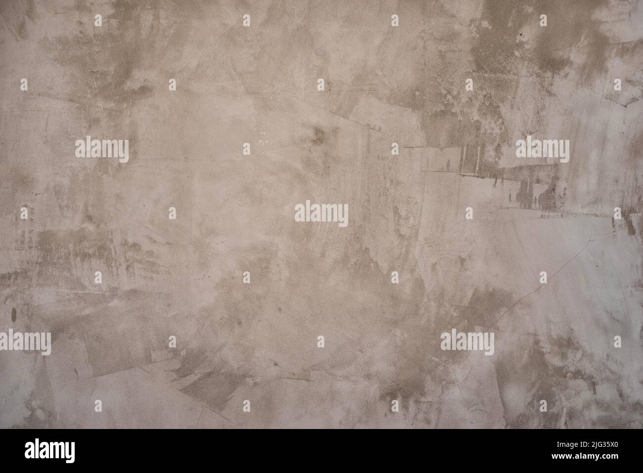 Neutral dark gray texture of a cement wall with beautiful spatula stains Stock Photo