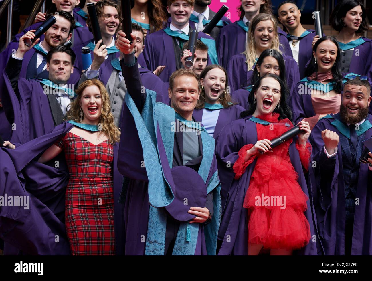 Outlander actor Sam Heughan with his honorary doctorate alongside other graduates from the Royal Conservatoire of Scotland in Glasgow. Picture date: Thursday July 7, 2022. Stock Photo
