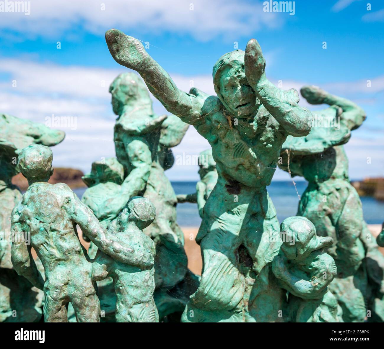 Fishing disaster memorial statue of miniature figures of widows and children by Jill Watson, Eyemouth, Berwickshire, Scotland, UK Stock Photo