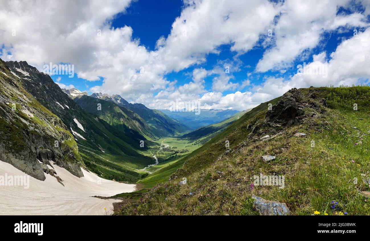 panoramic view mountain valley in background blue sky Stock Photo