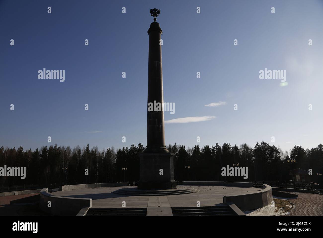 Monumental obelisk indicating the border between Europe and Asia in a forest near Ekaterinburg, Russia Stock Photo