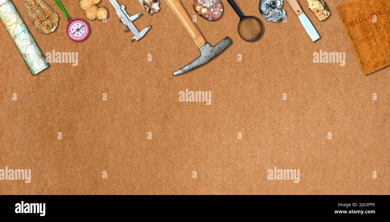 Topview of Set Fieldwork Geology Tools on Brown Background Stock Photo