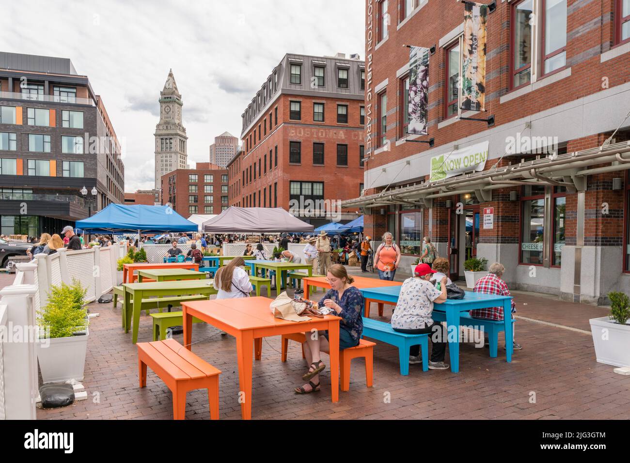 Boston, MA, USJune 11, 2022 People eating at outdoor seating near
