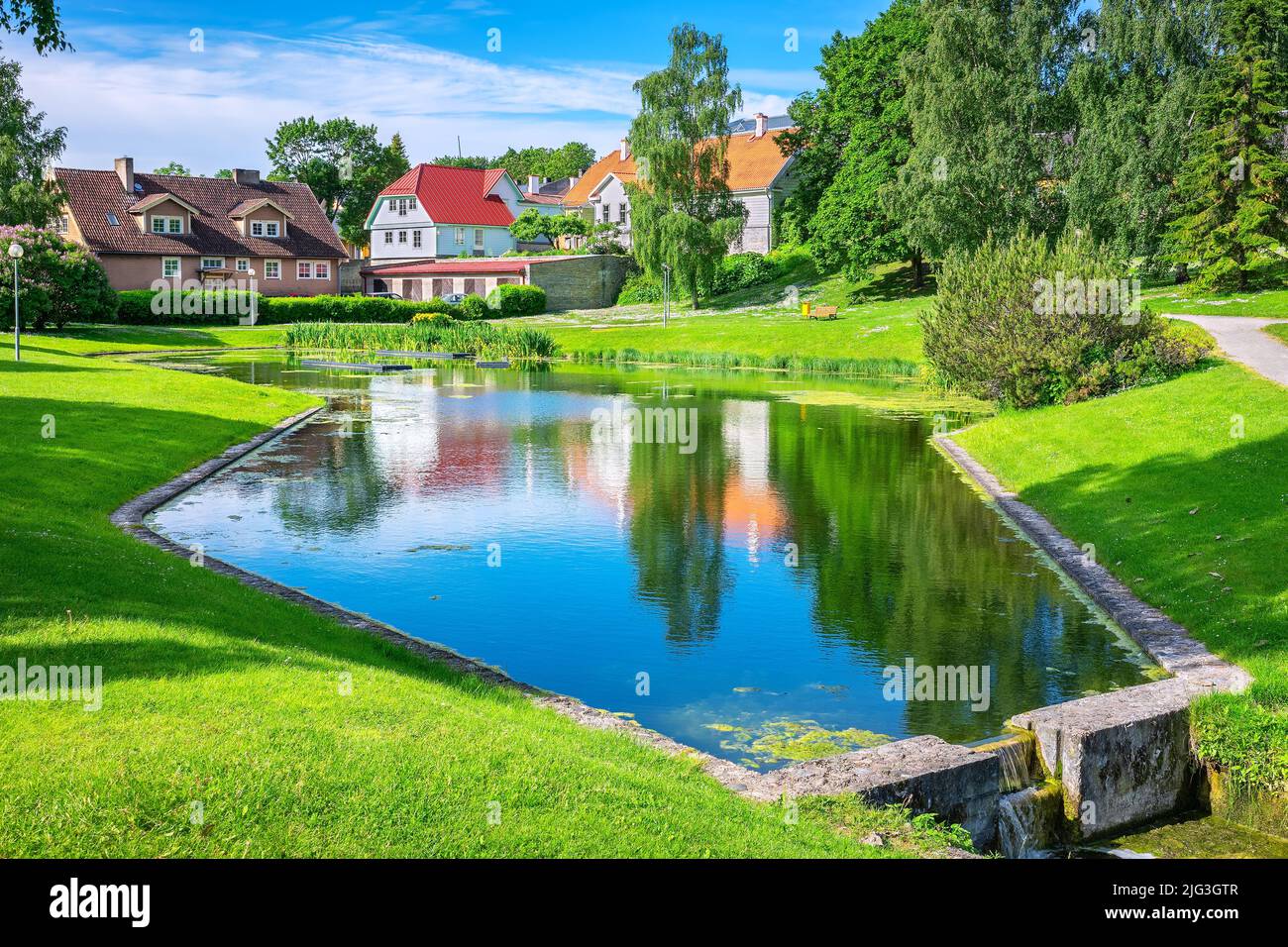 City landscape with pond and green park in Rakvere. Estonia, Baltic States Stock Photo