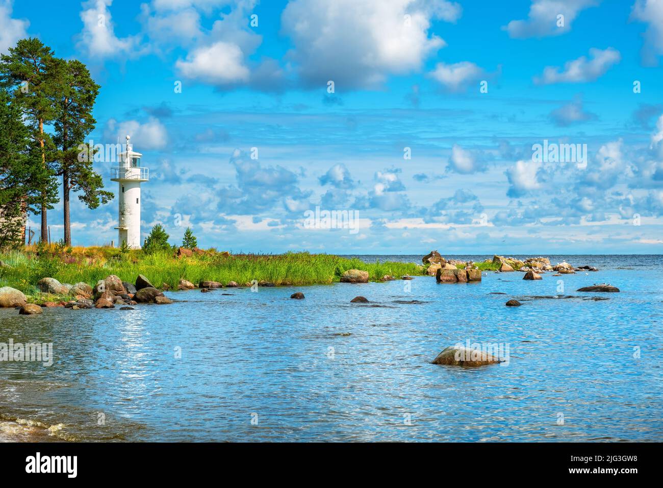 White lighthouse on the picturesque shore of the Baltic sea in Vergi village. Lahemaa natural park, Estonia Stock Photo