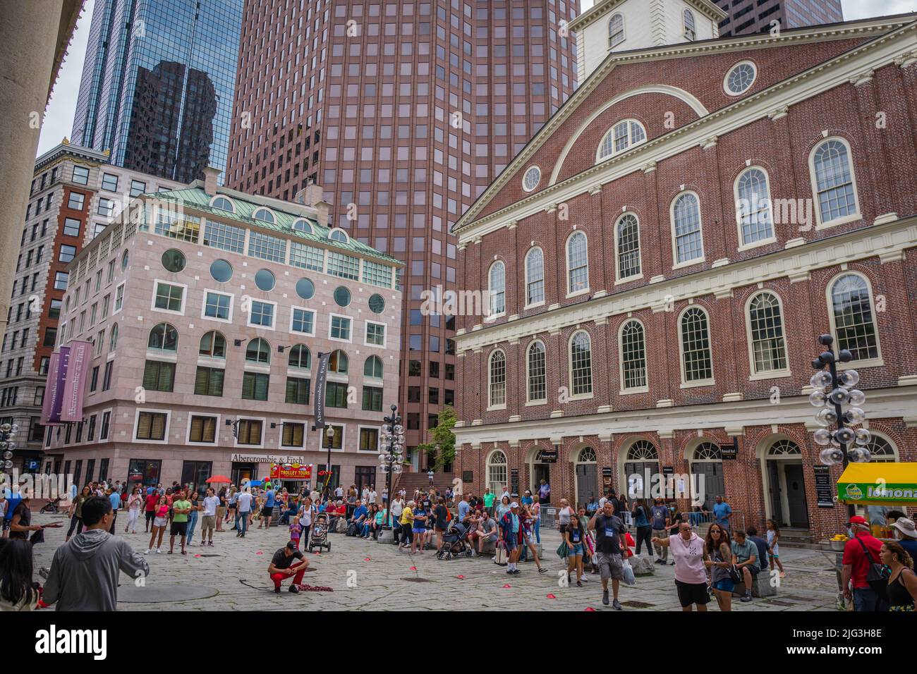 Boston, MA, US-June 11, 2022: Tourists at the landmark Faneuil Hall-Quincy Market food market in downtown Boston. Stock Photo