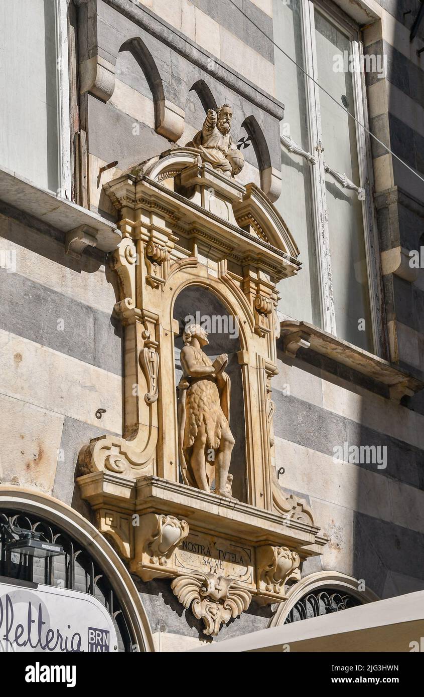 Close-up of the votive shrine dedicated to St John the Baptist, patron saint of Genoa, in Piazza di Soziglia in the old town, Liguria, Italy Stock Photo
