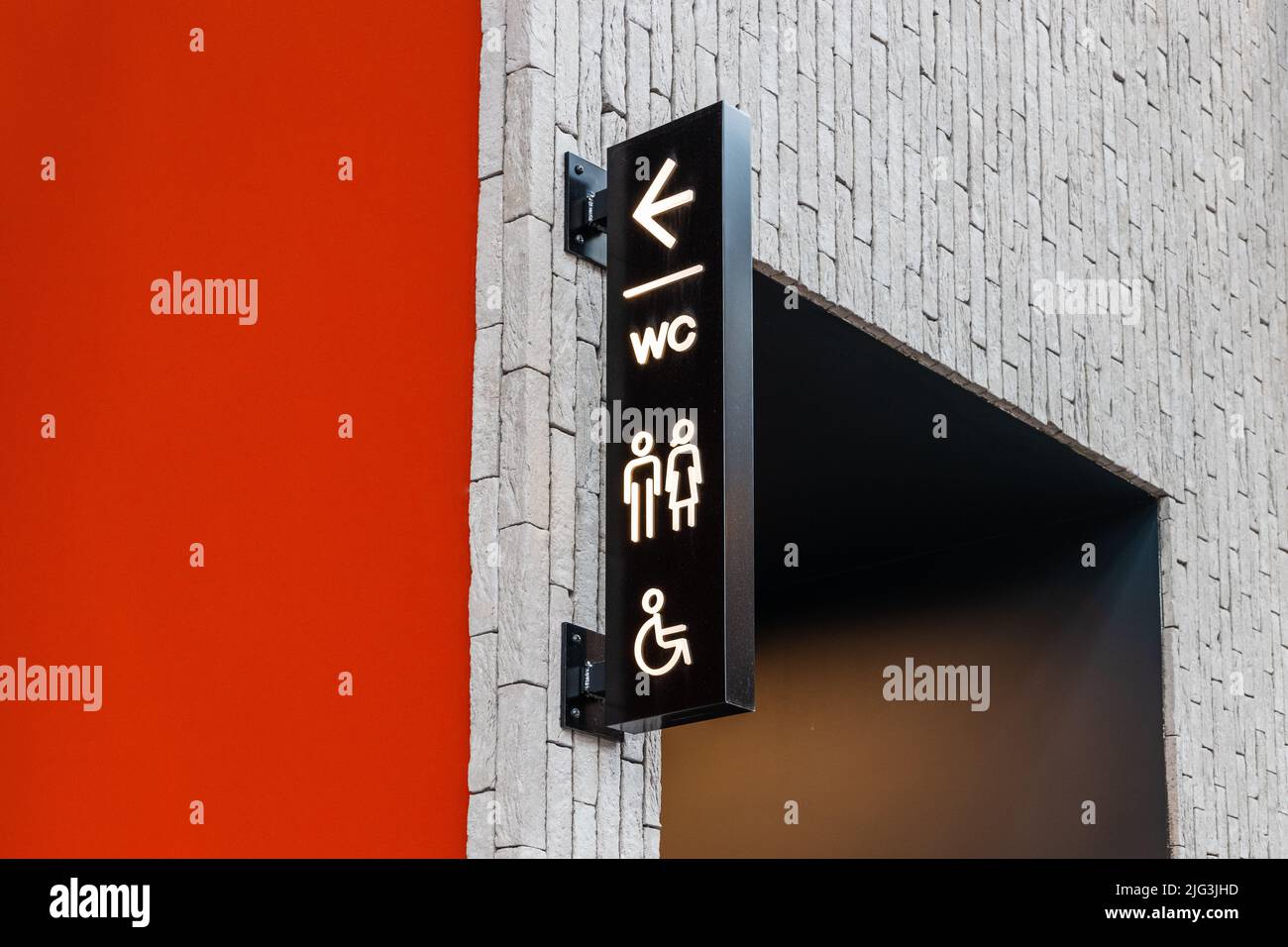 Public restroom signs with a disabled access symbol. Toilets icon Stock Photo