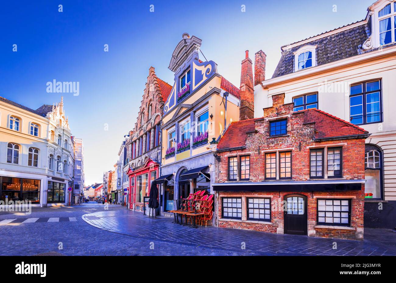 Bruges, Belgium. Medieval cobblestone street of Brugge, old Flanders gothic belgian city. Stock Photo