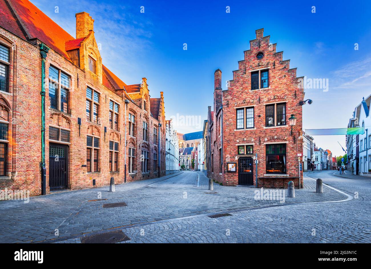 Bruges, Belgium. Idyllic view of historic city center of Brugge with Mariastraat in beautiful golden morning light at sunrise, belgian West Flanders. Stock Photo