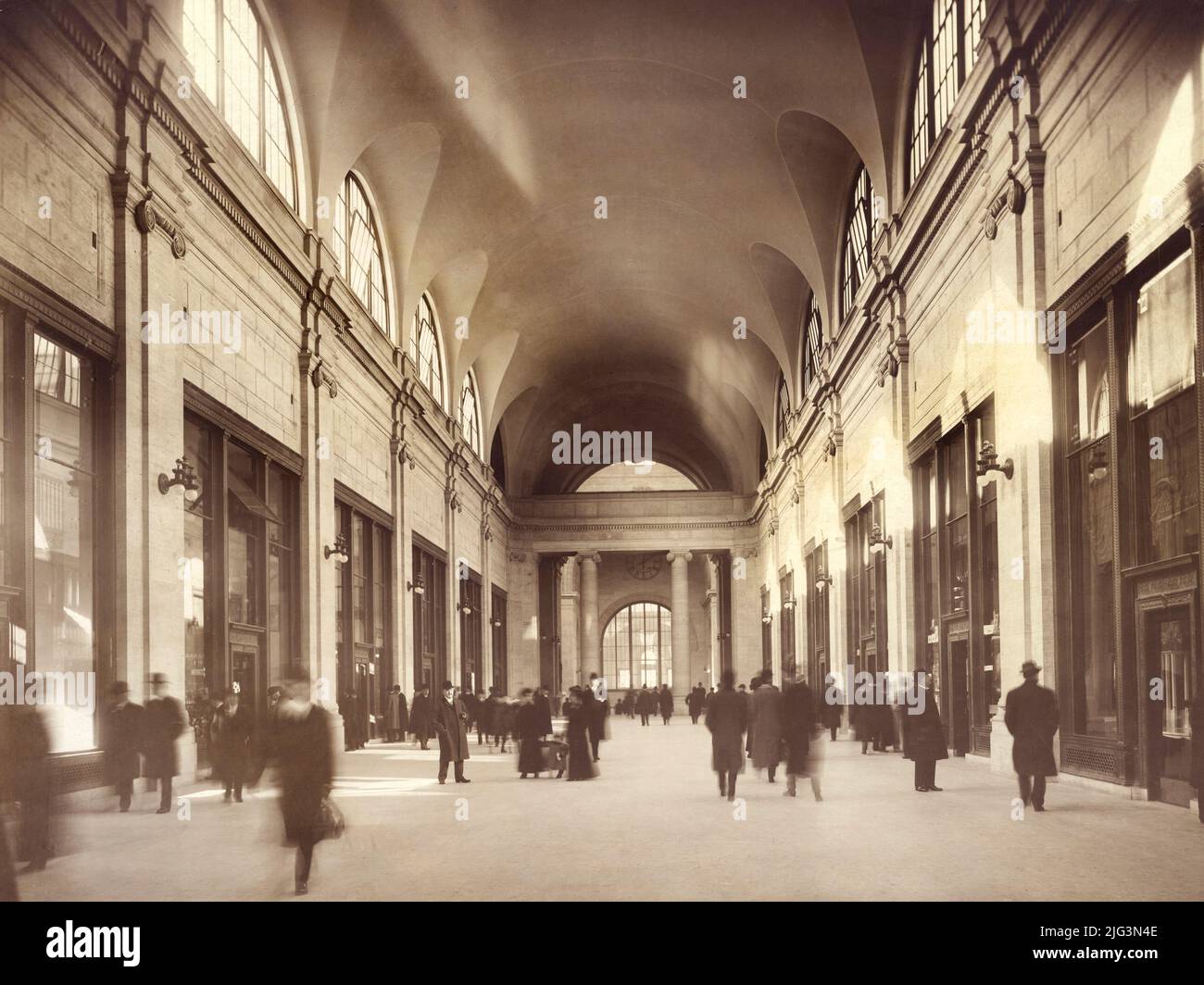 Passengers walking through Hallway, Pennsylvania Station, New York City, New York, USA, Unidentified Artist, 1911 Stock Photo
