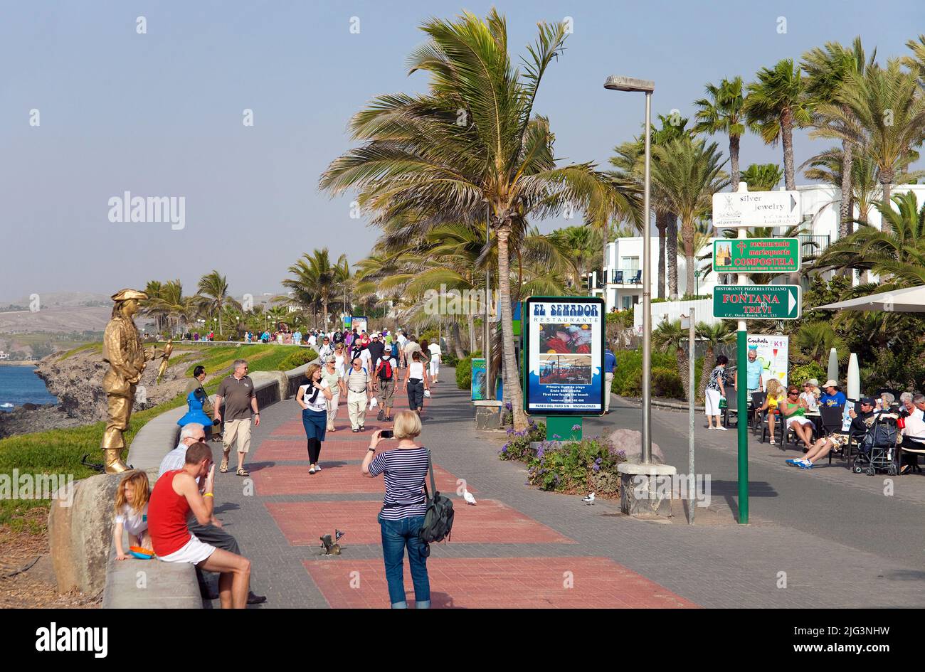 Human statue, street performer on Paseo de Meloneras, sea promenade at Maspalomas, Grand Canary, Canary islands, Spain, Europe Stock Photo