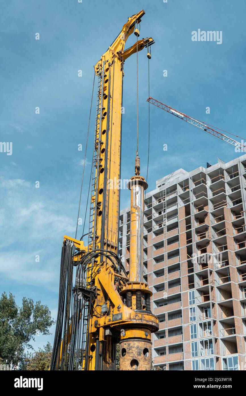 pile driver heavy machinery for concrete pouring at constructions Stock Photo