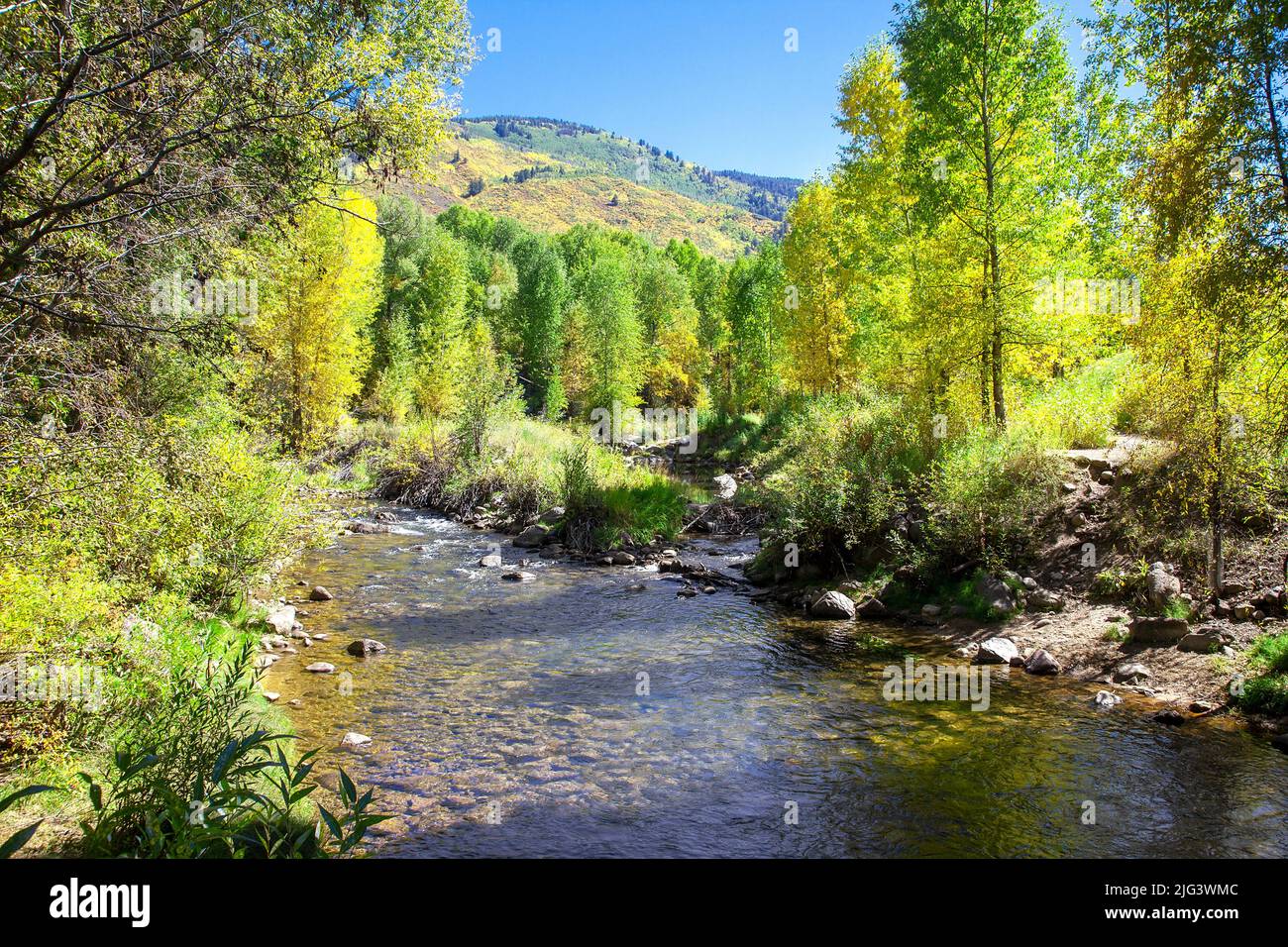 Colorful landscape, stream and mountains in rural Colorado Stock Photo