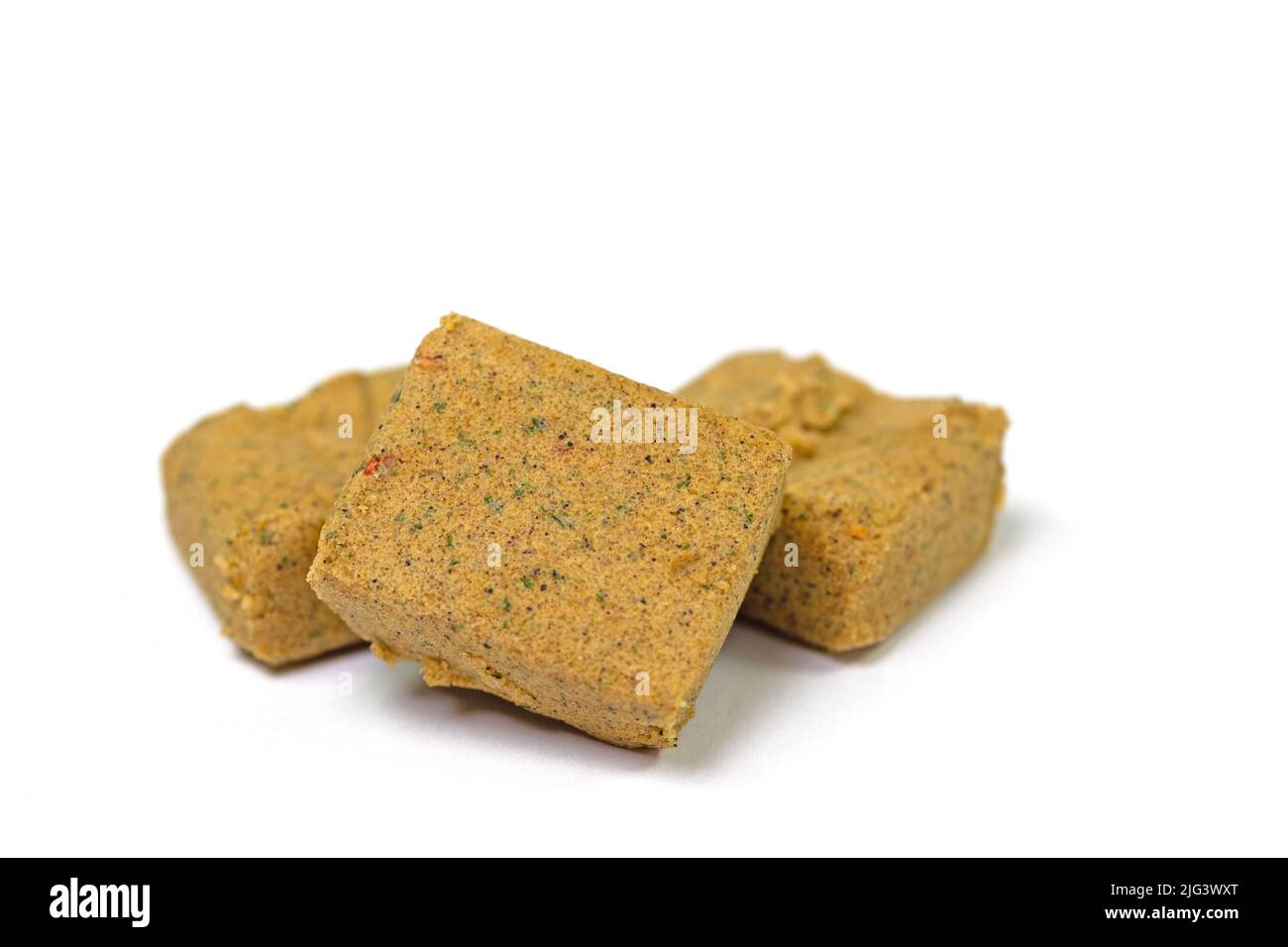 Vegetable bouillon, bouillon cubes isolated against white background Stock Photo Alamy